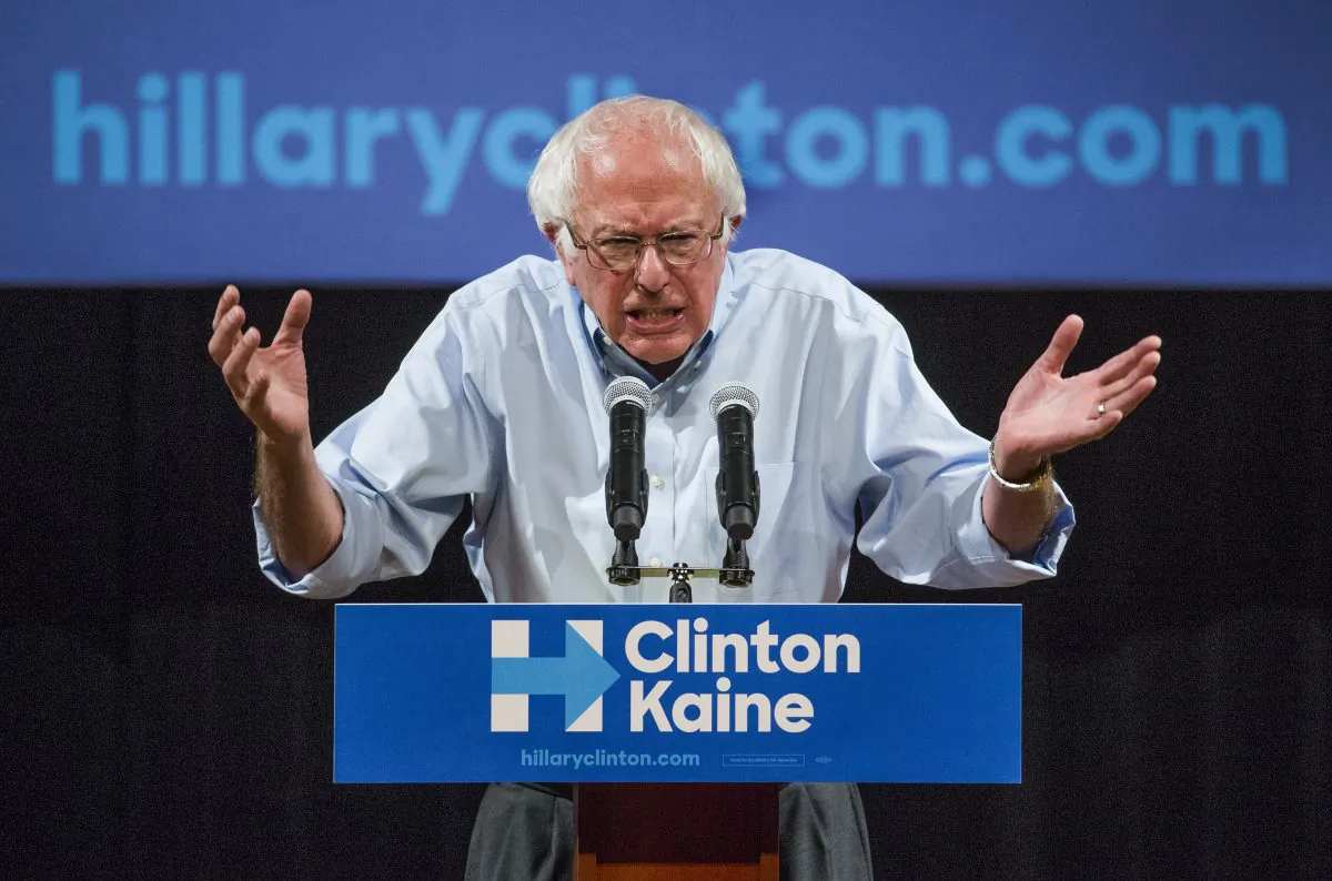 Bernie Sanders addresses a Clinton-Kaine rally inside the Prochnow Auditorium at Northern Arizona University on Oct. 18. (Tom Tingle/The Arizona Republic via AP)