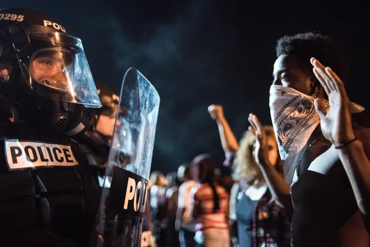 Police officers face off with protesters on the I-85 in Charlotte, N.C., on Sept. 21, 2016. (Sean Rayford/Getty Images)