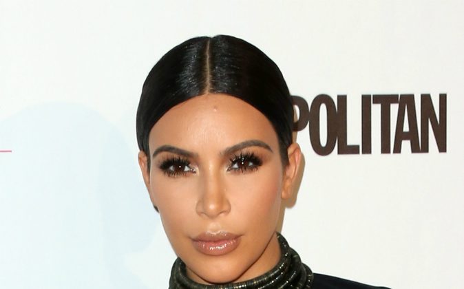 TV personality Kim Kardashian attends Cosmopolitan's 50th Birthday Celebration at Ysabel on October 12, 2015 in West Hollywood, California. Newly released footage showed the moment five armed men readied to rob Kardashian's home on Oct. 20. (Frederick M. Brown/Getty Images)