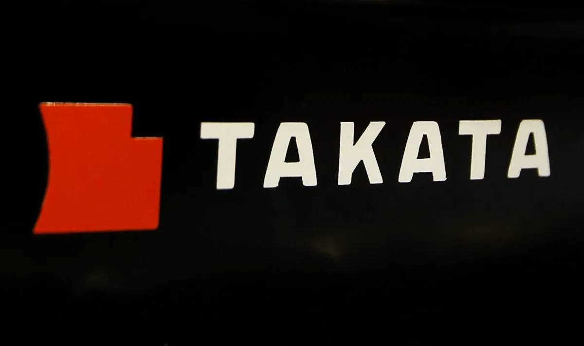 The logo of Takata Corp. is displayed at an auto supply shop in Tokyo on July 6, 2016. (Shizuo Kambayashi/AP Photo)