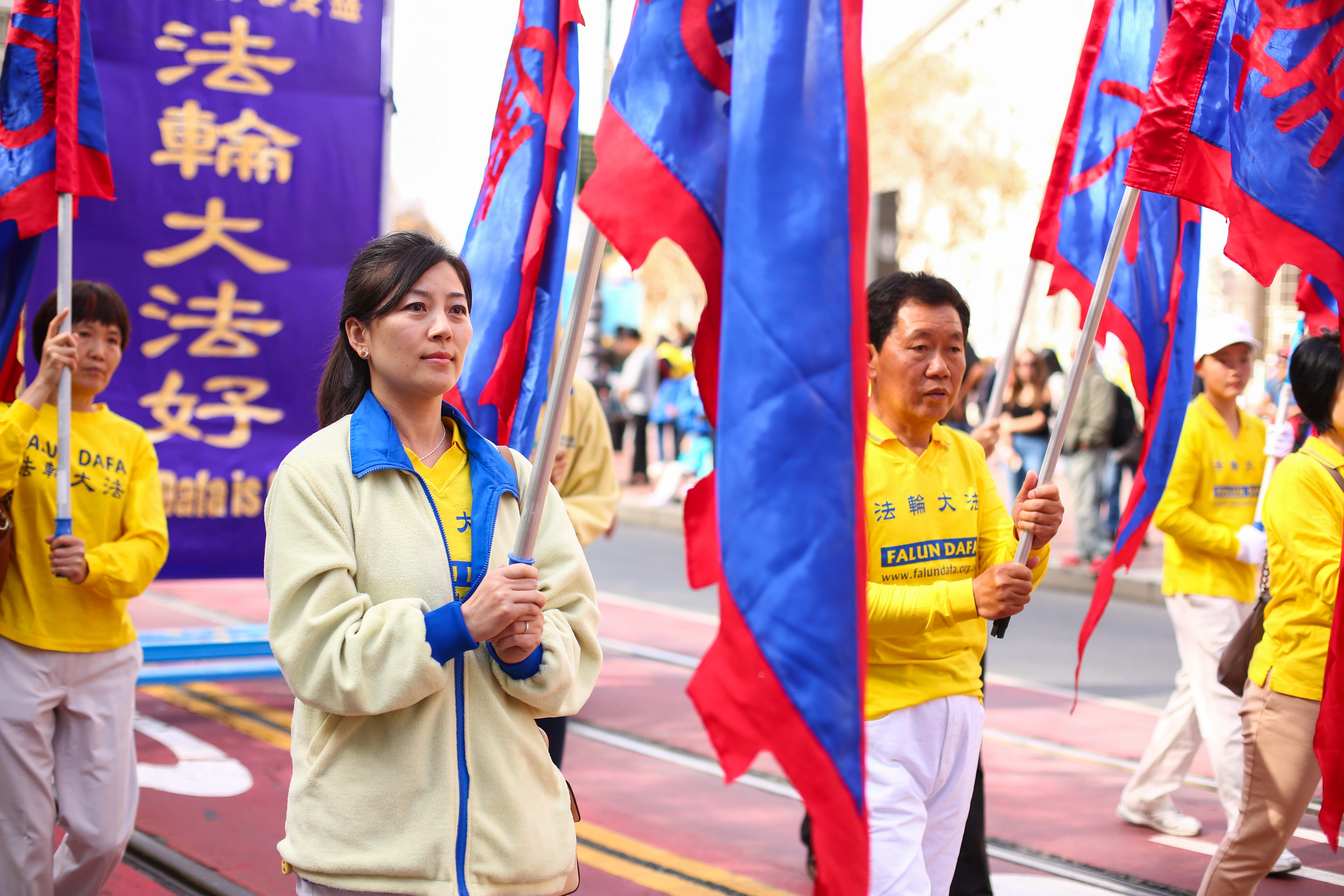 Over 5,000 practitioners and supporters of Falun Gong from over 30 countries march in a parade in San Francisco on Oct. 22, 2016, bringing awareness to the practice and calling an end to the persecution in China that started on July 20, 1999. (Benjamin Chasteen/Epoch Times)