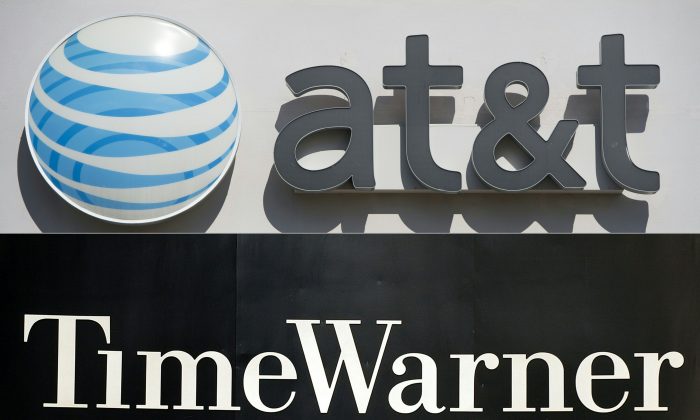 A montage of the logos of AT&T and Time Warner. After a protracted trial, the $85 billion merger is allowed to proceed, thanks to a healthy dose of economic reality. (Saul Loeb; Stan Honda/AFP/Getty Images)