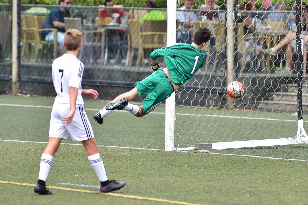 Albion score their 2nd goal against Colts in their 3-1 derby win in Division 1 of the Yau Yee League, at HKFC's Sport's road on Sunday Oct 23. (Bill Cox/Epoch Times)