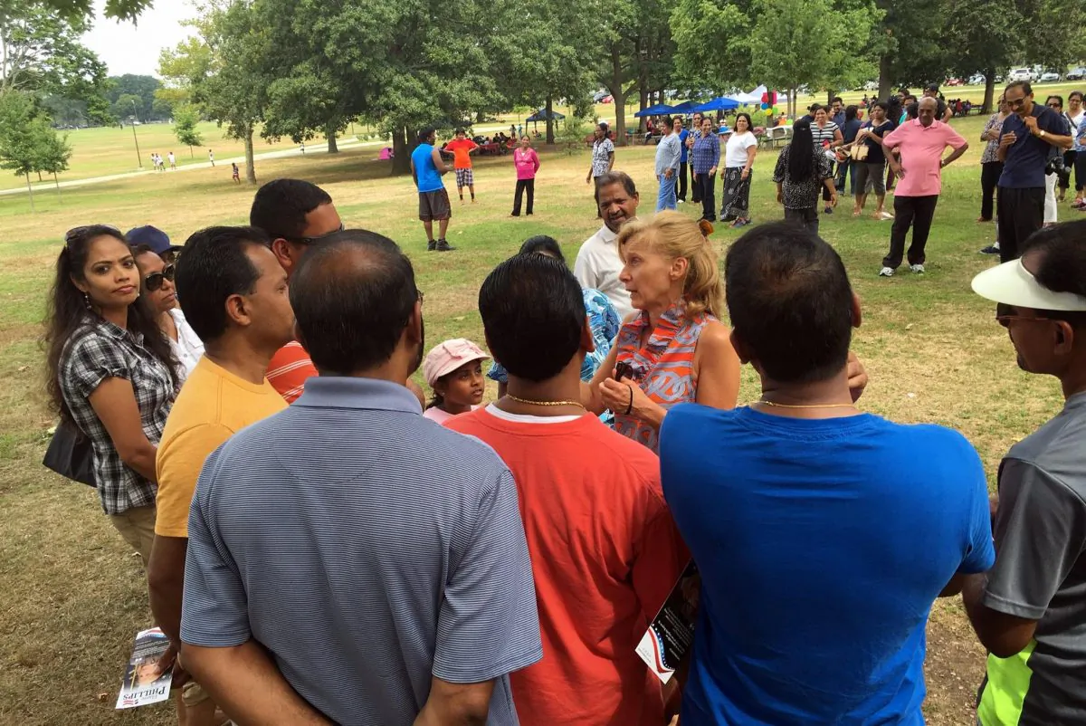 Elaine Phillips speaks with members of the growing Indian-American community in her Senate District. The 7th District is among the most ethnically diverse on Long Island.