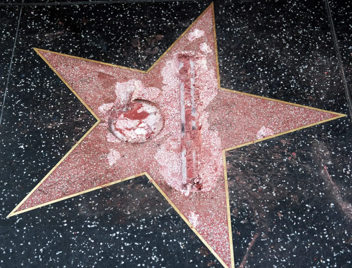 The vandalized star for Republican presidential candidate Donald Trump on the Hollywood Walk of Fame in Los Angeles, on Oct. 26, 2016. (AP Photo/Richard Vogel)