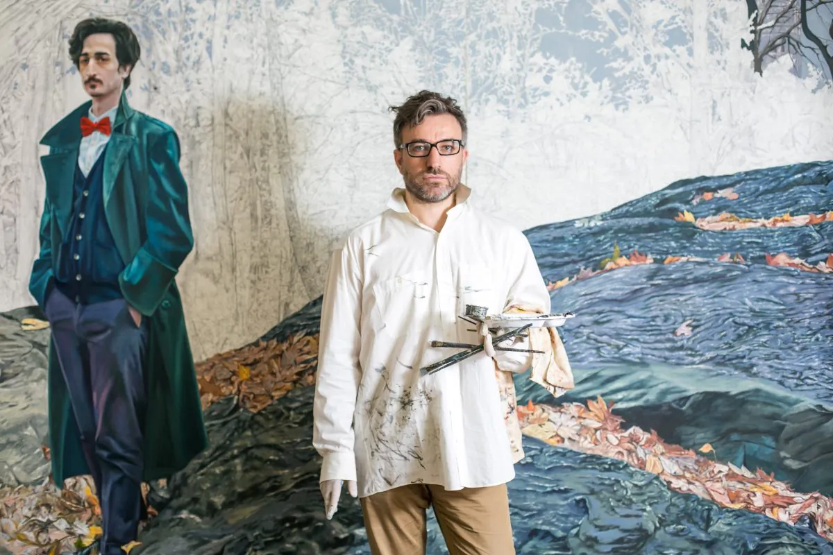 Fernando Martin Diez-Cabeza with his unfinished painting “The Gentleman With the Red Bow Tie," at his apartment in New York on Aug. 28, 2016. (Benjamin Chasteen/Epoch Times)