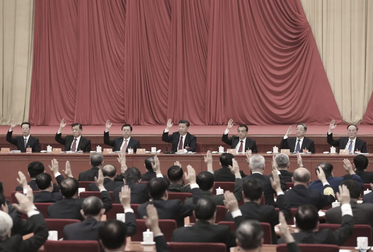 Chinese leader Xi Jinping (C) and other members of the Politburo Standing Committee attend the Sixth Plenary Session of the 18th Central Committee in Beijing on Oct. 27, 2016. (Li Xueren/Xinhua via AP)