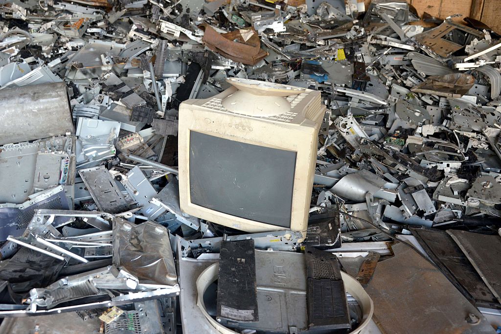 A computer screen is placed on a pile of scrap metal at a breakage yard, where old electrical and electronic items are sold in a district of Abidjan, Ivory Coast, on October 8, 2015. (Issouf Sanogo/AFP/Getty Images)
