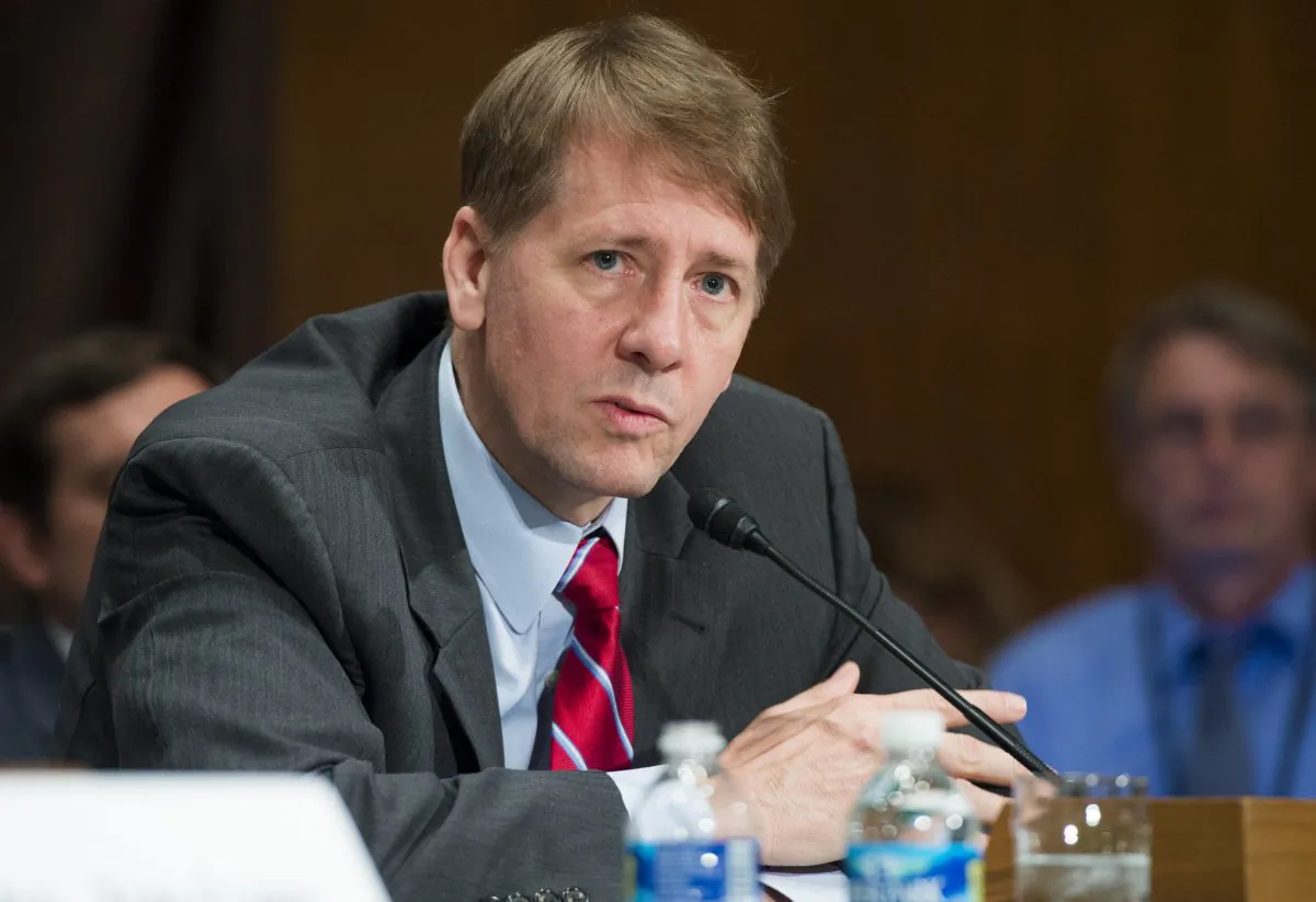 Richard Cordray, director of the Consumer Financial Protection Bureau (CFPB), testifies about the unauthorized opening of accounts by Wells Fargo during a Senate Banking, Housing and Urban Affairs Committee hearing on Capitol Hill on Sept. 20, 2016. (Saul Loeb/AFP/Getty Images)