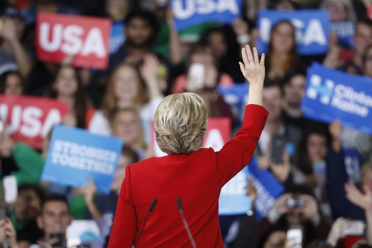Democratic presidential candidate Hillary Clinton waves to the crowd during a campaign rally at Kent State University, Monday, Oct. 31, 2016, in Kent, Ohio. (AP Photo/John Minchillo)