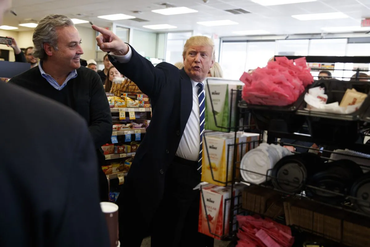 Republican presidential candidate Donald Trump talks with customers during a visit to a Wawa gas station in King of Prussia, Pa., on Nov. 1, 2016.(AP Photo/ Evan Vucci)