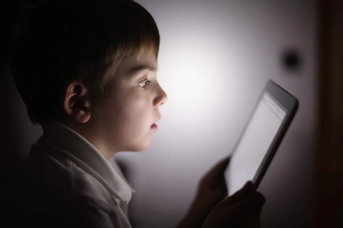 Children Interacting With Tablet Technology. (Christopher Furlong/Getty Images)