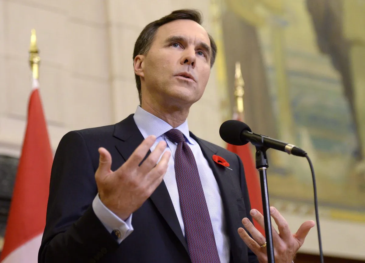 Canadian Minister of Finance Bill Morneau speaks to reporters before tabling the Fall Economic Statement on Parliament Hill on Nov. 1, 2016 in Ottawa. (The Canadian Press/Justin Tang)