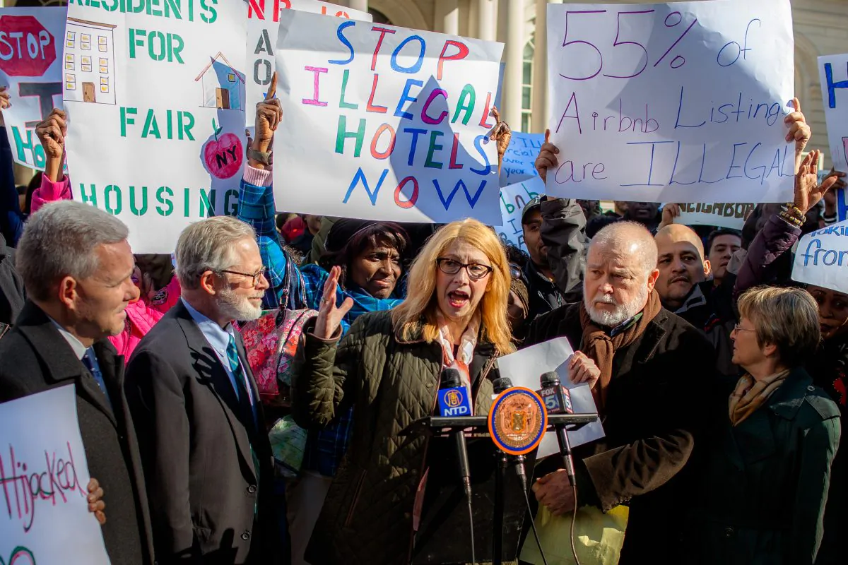 New York State Assemblywoman Linda Rosenthal speaks at a rally against Airbnb in front of the City Hall in New York on Nov. 1, 2016. The rally was largely attended by members of the Local 6, the city's hotel employees union. (Petr Svab/Epoch Times)