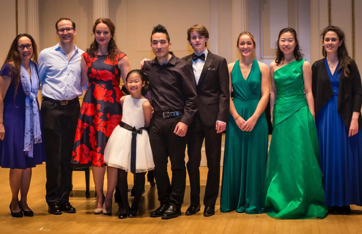 NY Concerti Sinfonietta features seven Shining Stars and one rainbow. (L–R) Julie Jordan, artistic director/founder of New York Concerti Sinfonietta; John Bell, pianist who accompanied "Finian's Rainbow" star; singer and star Melissa Errico; violinist Lauren Yoon; violinist David Marks; pianist Eoín Fleming; violinist Claire Austen; violist Annie Xue Ding, and cellist Aoife Burke, onstage at Carnegie Hall. (James Hall)