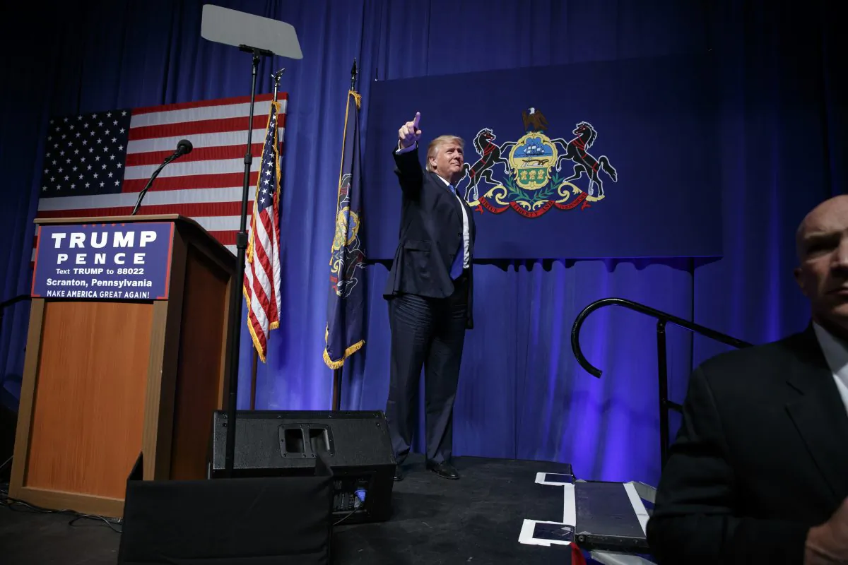 Republican presidential candidate Donald Trump arrives to speak at a campaign rally at Lackawanna College, Monday, Nov. 7, 2016, in Scranton, Pa. (AP Photo/ Evan Vucci)