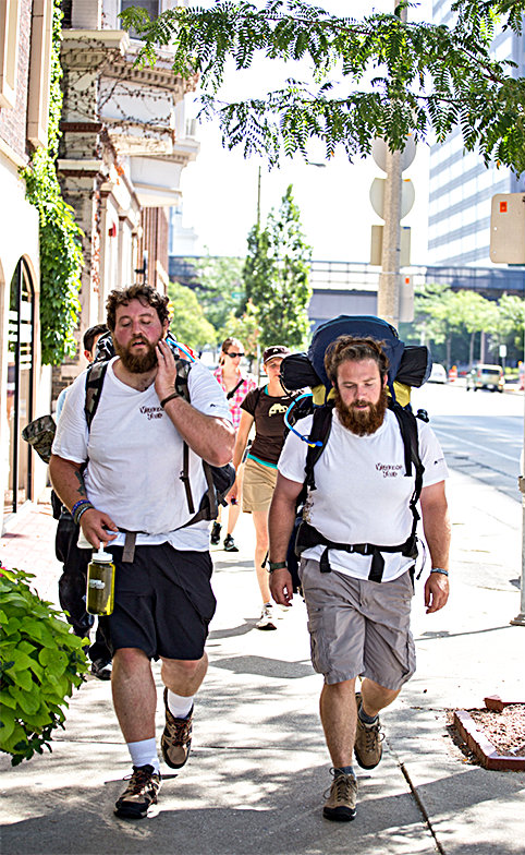 Anthony Anderson (L) and Tom Voss in Milwaukee on Aug. 30, 2013, as they start out on the Veterans Trek. (almost sunrise)