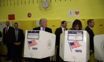 Photo: Trump Glances Over at Wife While Voting
