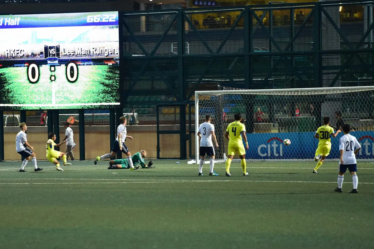 Winner from Chiu Chun-kit, of Lee Man Rangers in 70th minute, after scoring from the rebound once Issey Maholo pof Hong Kong Football Club had saved Cheung Kin-fung’s free kick, in the HKFA Premier League at HKFC on Friday No 4, 2016. (Bill Cox/Epoch Times)
