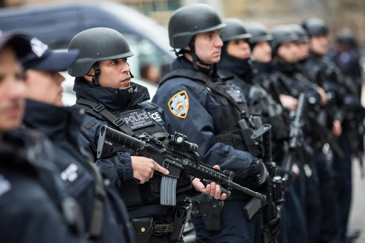 Members of the New York Police Department (NYPD) Strategic Response Group stand outside NYPD headquarters in New York City, N.Y., on Feb. 17, 2016. (Andrew Burton/Getty Images)
