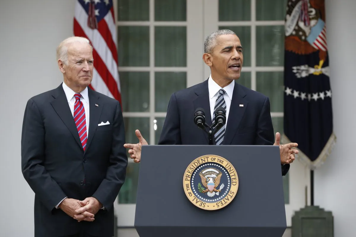 President Barack Obama, accompanied by Vice President Joe Biden, speaks in the Rose Garden of the White House in Washington, on Nov. 9, 2016. (AP Photo/Pablo Martinez Monsivais)
