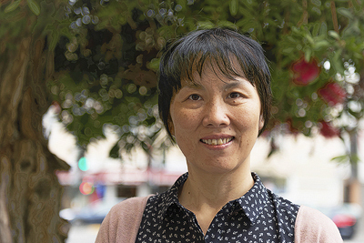 Sunny Guo is pleased to be able to practice her faith freely in the United States. For not renouncing her belief in Falun Gong, she was persecuted in a forced labor camp, detention center, and brainwashing center in China. (Cat Rooney/Epoch Times) 
