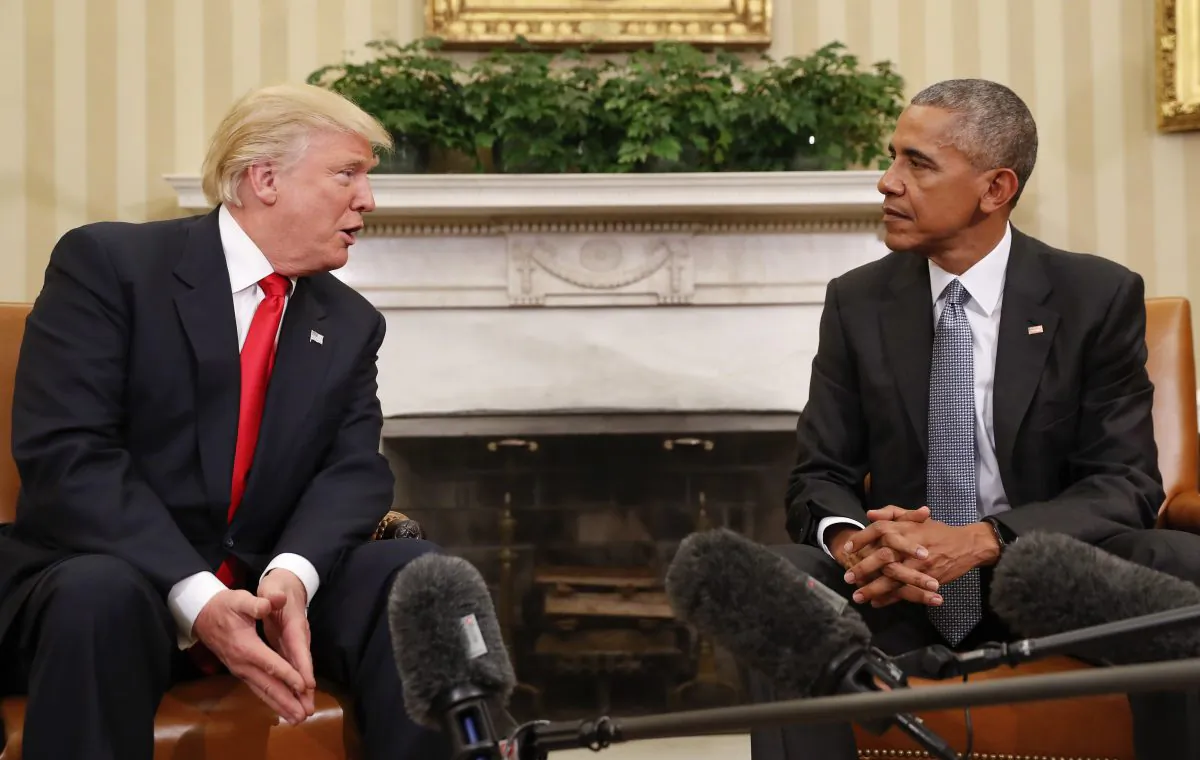 President Barack Obama listens to President-elect Donald Trump speak during their meeting in the Oval Office of the White House in Washington on Nov. 10, 2016. (AP Photo/Pablo Martinez Monsivais)