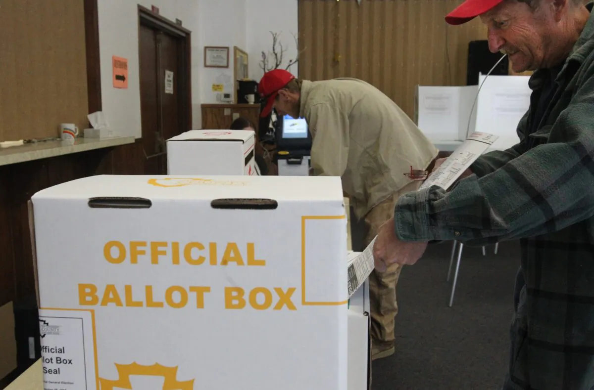 A voter casts their ballot at a polling station in the Summit Christian Fellowship in California on Nov. 8, 2016. (BILL WECHTER/AFP/Getty Images)