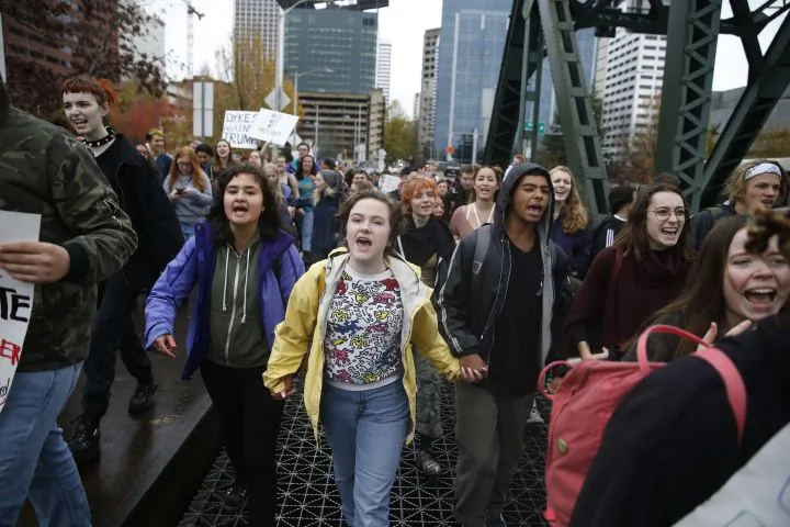 Portland Public School students walked out of schools Monday, Nov. 14, 2016, and converg on Pioneer Courthouse Square and crossed the Hawthorne Bridge for a protest against the results of last week's presidential election. Hundreds of high school students joined protests in Portland on Monday against Donald Trumps election (Beth Nakamura/The Oregonian via AP)