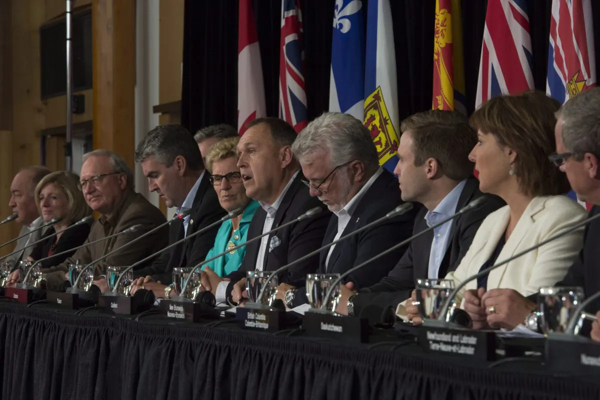 Canada’s premiers are seen during the closing news conference following a meeting in Whitehorse, Yukon, to discuss creation of a Canadian free-trade agreement between provincial and territorial jurisdictions, on July 22, 2016. (THE CANADIAN PRESS/Jonathan Hayward)