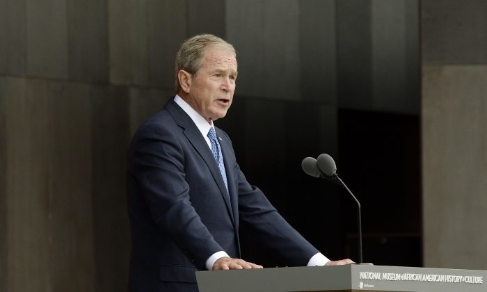 Former U.S President George W. Bush speaks at the opening ceremony of the Smithsonian National Museum of African American History and Culture in Washington, DC on Sept. 24, 2016. The museum is opening thirteen years after Congress and President George W. Bush authorized its construction. (Olivier Douliery-Pool/Getty Images)