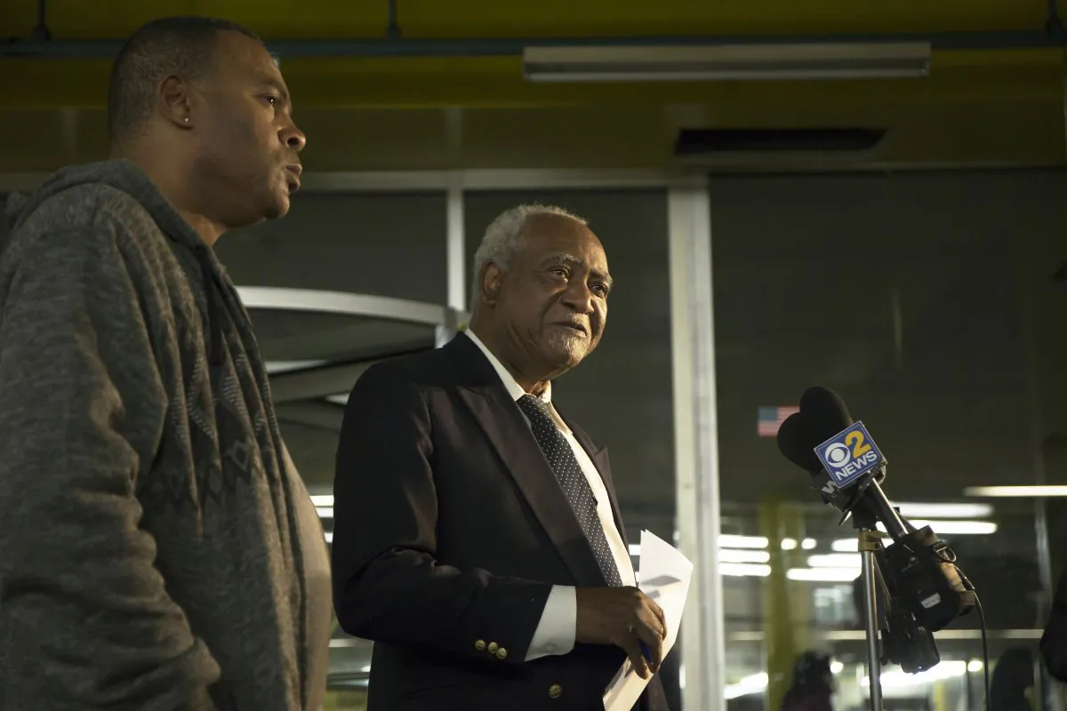 U.S. Rep. Danny Davis, (D-Ill.) (C), and his son, Stacey Wilson, give a news conference at the 5th District police department in the Englewood neighborhood of Chicago on Nov. 18, 2016. (Alyssa Pointer/Chicago Tribune via AP)