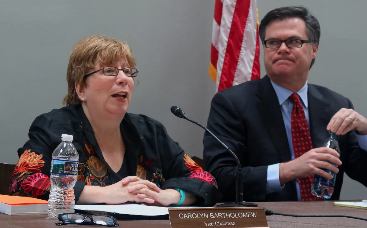 Carolyn Bartholomew, Vice Chairman of the U.S.-China Economic and Security Review Commission, introduces the Commission's 2016 Annual Report to the Congress, on November 16 on Capitol Hill. To her left is Chairman Dennis C. Shea who spoke before her. The bipartisan commission reports to Congress on national security implications and the economic relationship between the U.S. and People's Republic of China. (Gary Feuerberg/ Epoch Times)