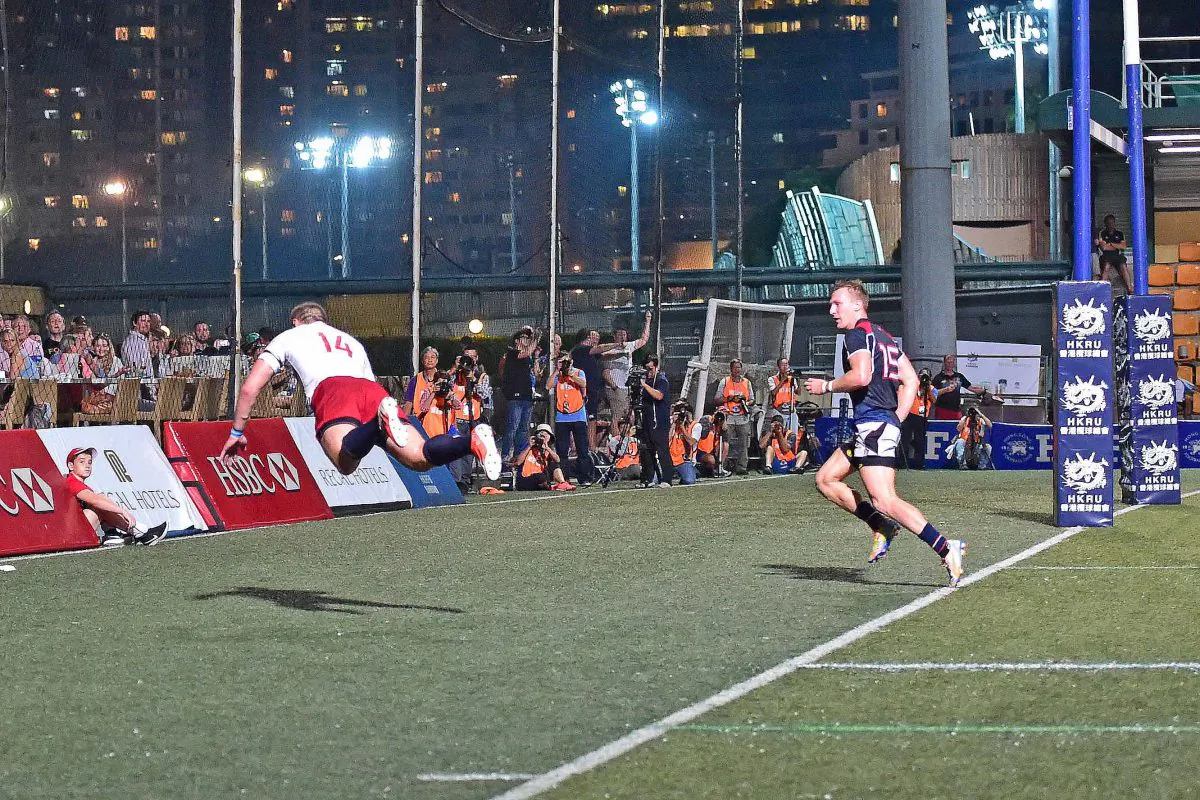 Celebration final try Russia as Denis Simplikevich dives over the try line in the 80th minute in their Cup of Nations match against Hong Kong, at the HKFC on Saturday Nov 19. Russia’s 27-0 win in this game was the decider for the title. (Bill Cox/Epoch Times)