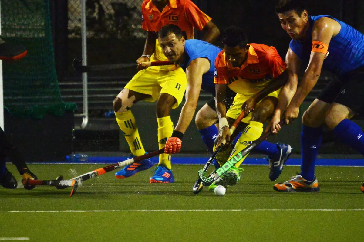 Uzbekistan defenders in a rush to clear the ball inside their goal area as Sri Lankans striker lurk for an opening in their defence - Sri Lanka went on to win 7-2. This was the opening game for both sides in the 2016 5th AHF Men's Cup played at King's Park on Sunday Nov 20, 2016. (Eddie So)
