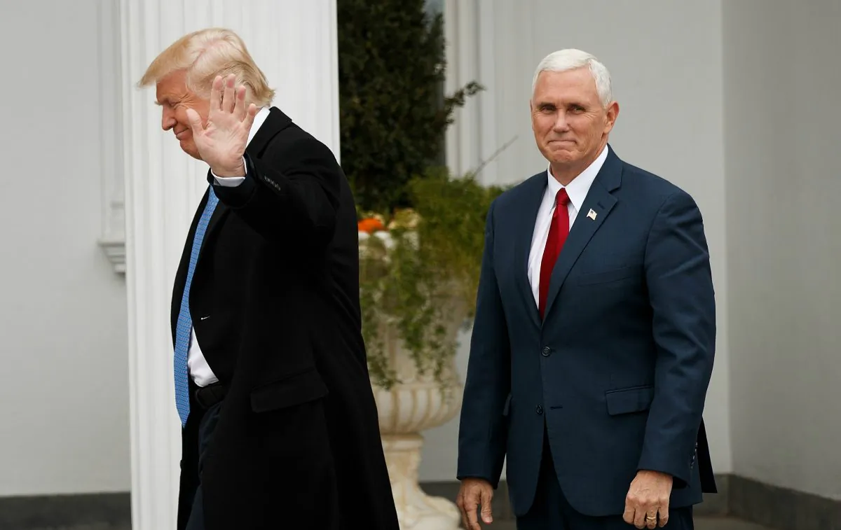 President-elect Donald Trump and Vice President-elect Mike Pence arrive at the clubhouse at Trump International Golf Club for a day of meetings in Bedminster Township, New Jersey on Nov. 20, 2016. (Drew Angerer/Getty Images)