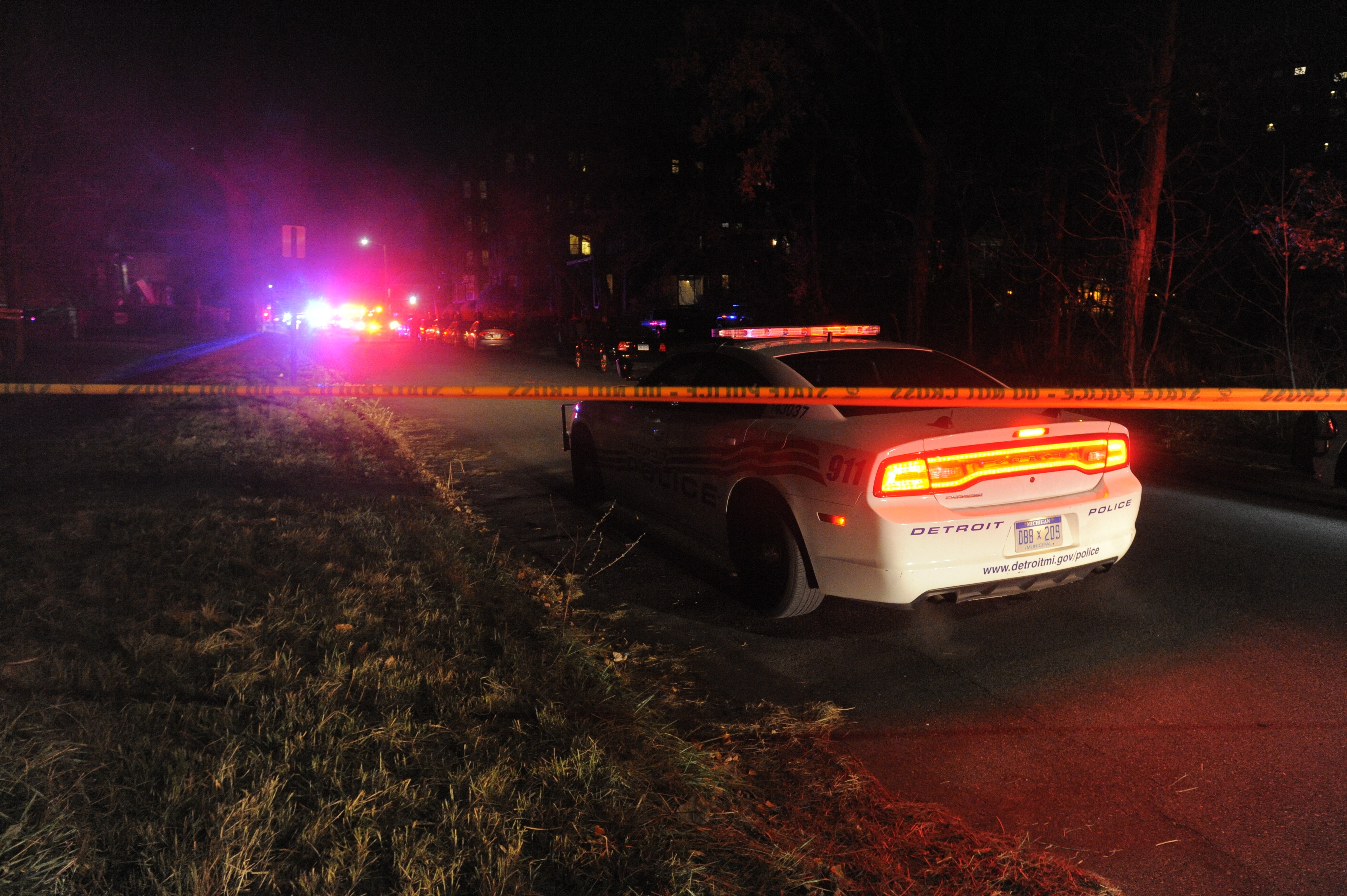 Authorities investigate after shooting of a Wayne State University officer in Detroit on Nov. 22, 2016. (Steve Perez/Detroit News via AP)