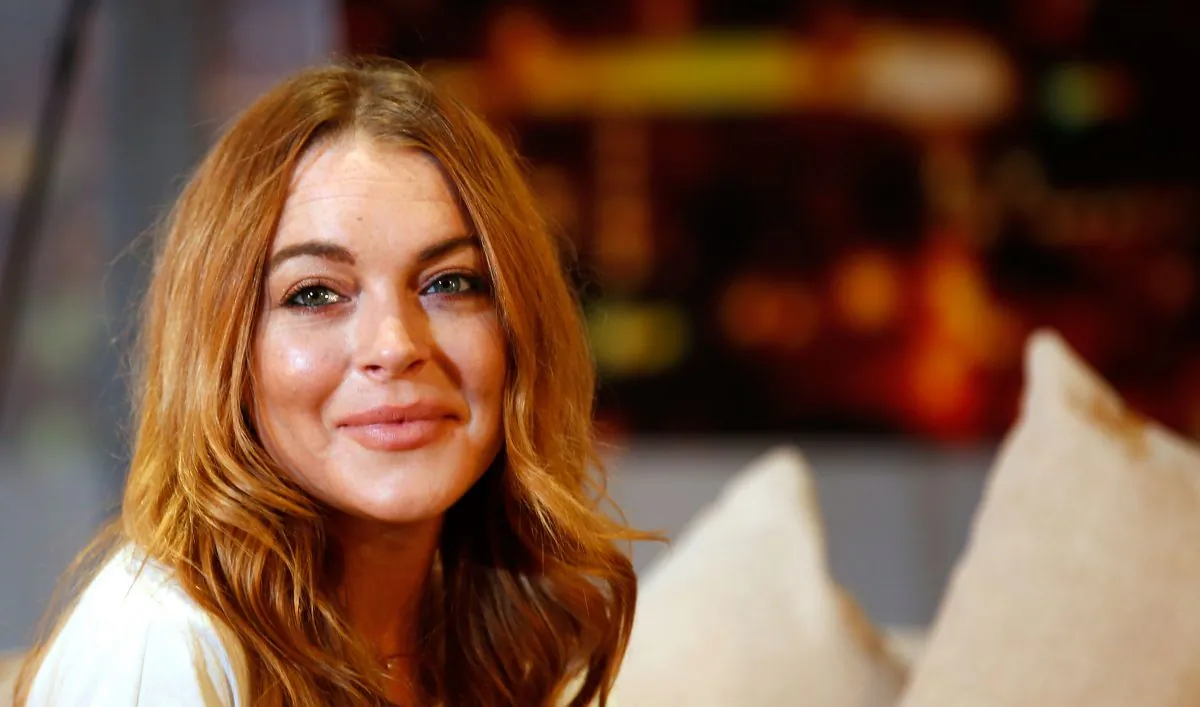 Lindsay Lohan performs during a photocall for "Speed The Plow" at Playhouse Theatre on September 30, 2014 in London, England. (Photo by Tim P. Whitby/Getty Images)