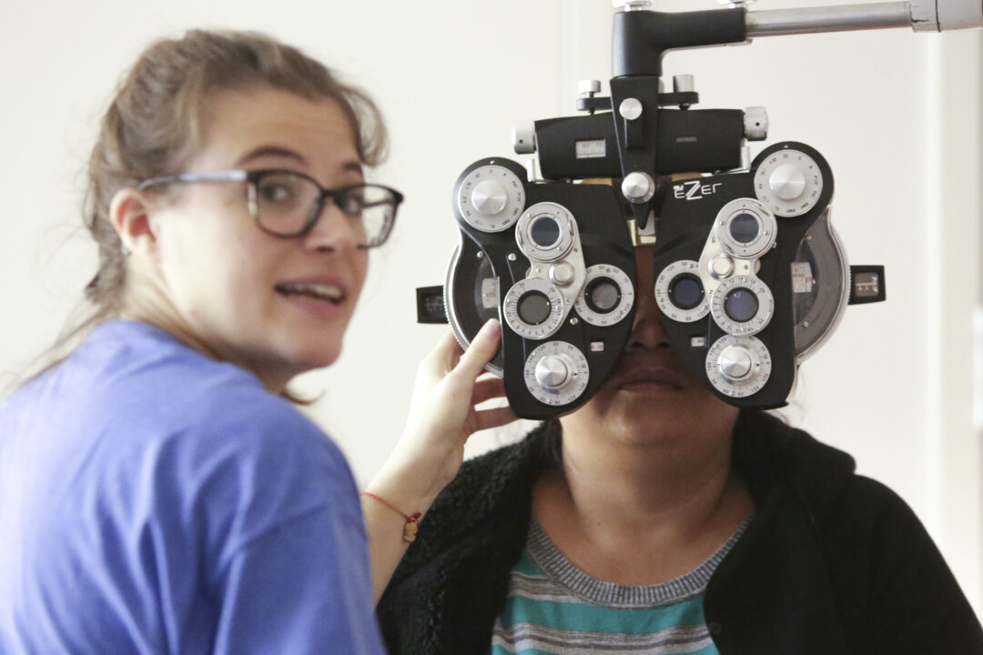 A woman gets an eye exam. (Jason RE/AFP/Getty Images)