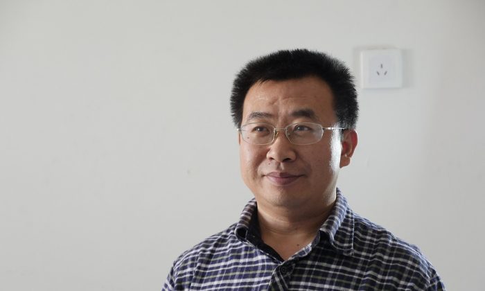 Chinese human rights lawyer Jiang Tianyong in a recent photo. Official Chinese media confirmed on Dec. 16 that Jiang was taken into custody. (Epoch Times)