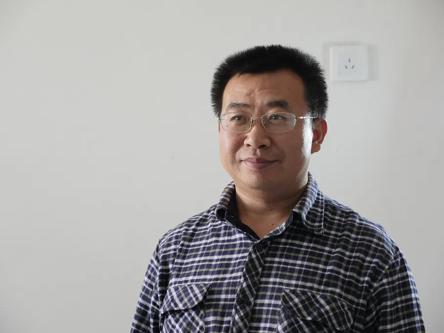 Chinese human rights lawyer Jiang Tianyong in a recent photo. Official Chinese media confirmed on Dec. 16 that Jiang was taken into custody. (Epoch Times)
