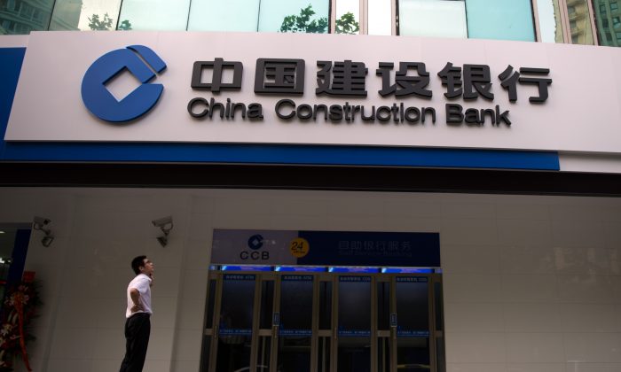A photo taken on Aug. 28, 2014 shows a branch of the of the China Construction Bank in Shanghai. (Johannes Eisele/AFP/Getty Images)