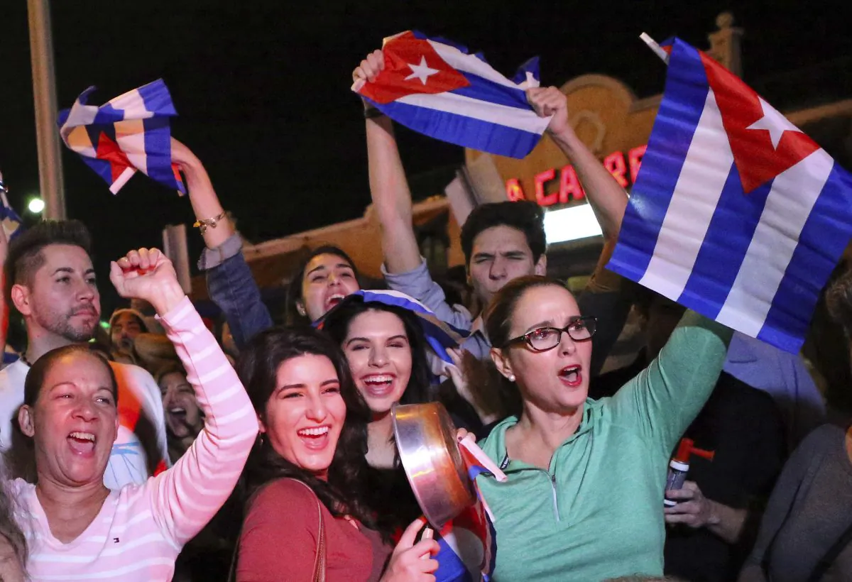 In this file photo, the Cuban community in Miami celebrates the announcement that Fidel Castro died in front La Carreta Restaurant early in Miami on Nov. 25, 2016. (David Santiago)