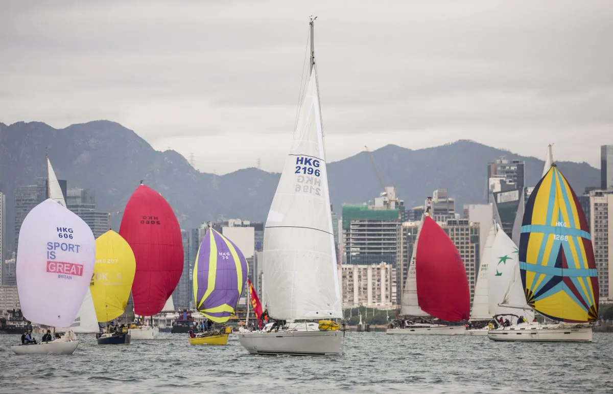 Boats set off from the Royal Hong Hong start line in Victoria Harbour on their 26Nm journey around Hong Kong Island on Sunday Nov 27, 2016. (RHKYC / Isaac Lawrence)