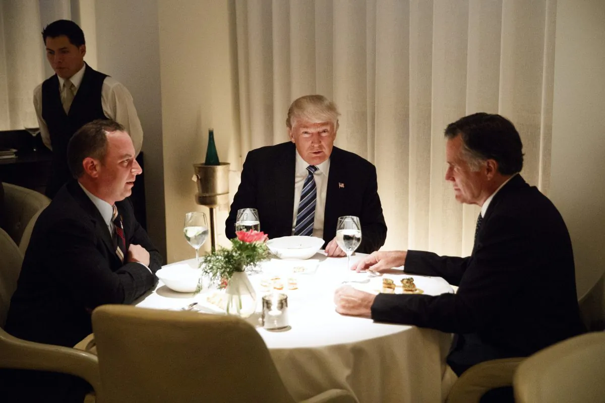 President-elect Donald Trump (C) eats dinner with Mitt Romney (R) and Trump Chief of Staff Reince Priebus at Jean-Georges restaurant in New York on Nov. 29, 2016. (AP Photo/Evan Vucci)