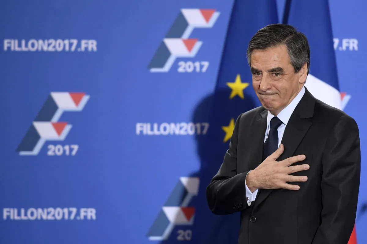 French member of Parliament and candidate for the right-wing primaries ahead of France's 2017 presidential elections, Francois Fillon gestures as he delivers a speech following the first results of the primary's second round on November 27, 2016, at his campaign headquarters in Paris.
France's conservatives held final run-off round of a primary battle on November 27 to determine who will be the right wing nominee for next year's presidential election. / AFP / Eric FEFERBERG (Photo credit should read ERIC FEFERBERG/AFP/Getty Images)