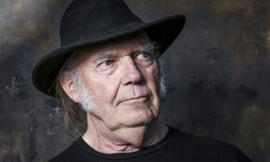 Neil Young Urges Spotify Employees to Quit Their Jobs, Tells Fans to Withdraw Money From Big American Banks