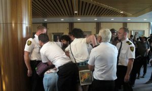 Protesters Against Australian Refugee Treatment Delay Parliament