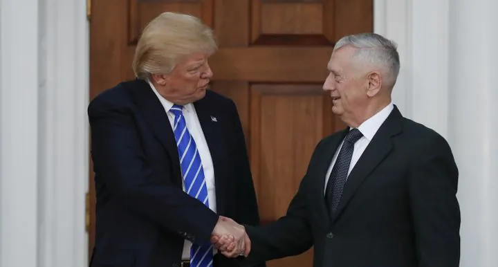 President-elect Donald Trump shakes hands with retired Marine Corps Gen. James Mattis at Trump National Golf Club Bedminster clubhouse in Bedminster, N.J., Saturday, Nov. 19, 2016. (AP Photo/Carolyn Kaster)