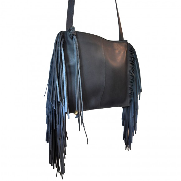 Hiwot grey leather bag with fringing. Fun, stylish, and well-made, it is a great size for every day and can be worn across the body for practicality. It is produced in Ethiopia by a woman-led small business, supporting the important leather and craft industry in Ethiopia. £145 danaqa.com